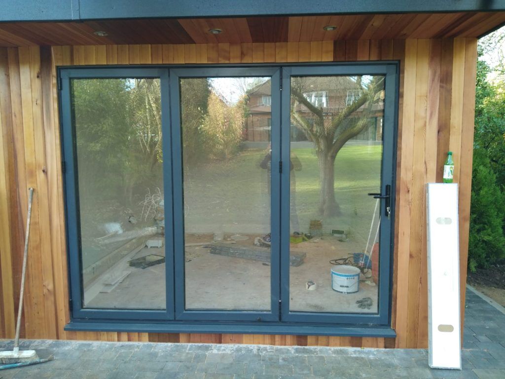 Bifold doors for outhouse gym area