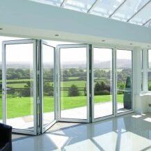 White bifold aluminium doors