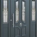 Grey Front door inaluminum with a wooden look finish belonging to east St Awdry's Rd, Barking IG11 7QB