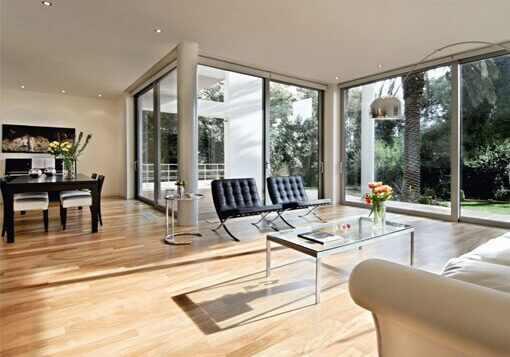 living room area with aluminium windows and doors in the background