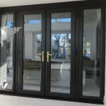 black french doors with side panels
