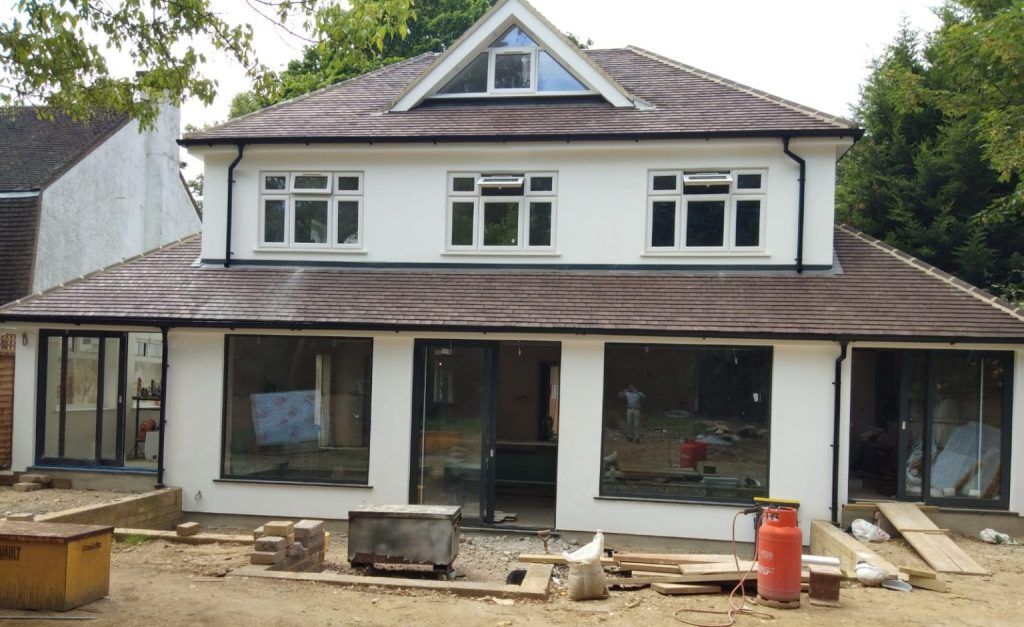 Custopmer home in gerrards cross with shaped windows, casement windows and sliding doors
