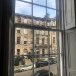 COMMERCIAL SASH WINDOW FROM THE INSIDE LOOKING OUT TO A CENTRAL LONDON STREET