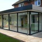 Corner sliding doors